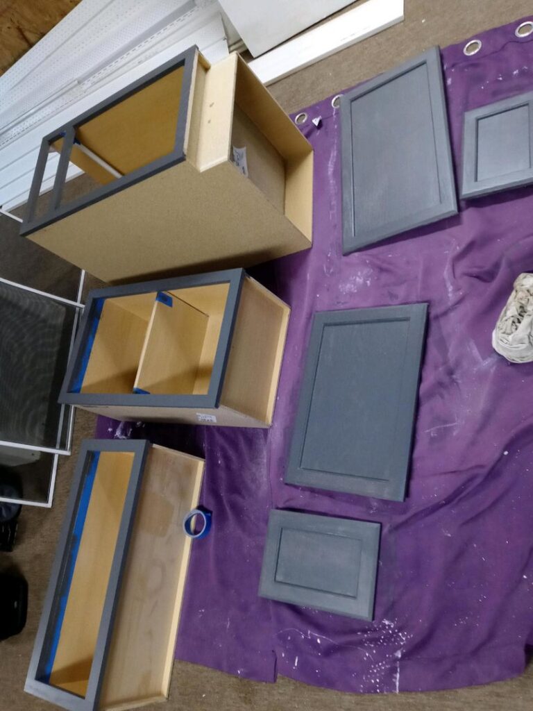 Cabinet assembly and painting work by Vermont Professional Solutions LLC in South Burlington, VT.