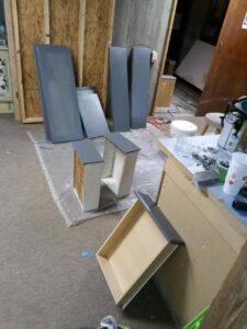 Cabinet refinishing and painting in progress by Vermont Professional Solutions LLC in South Burlington, VT.