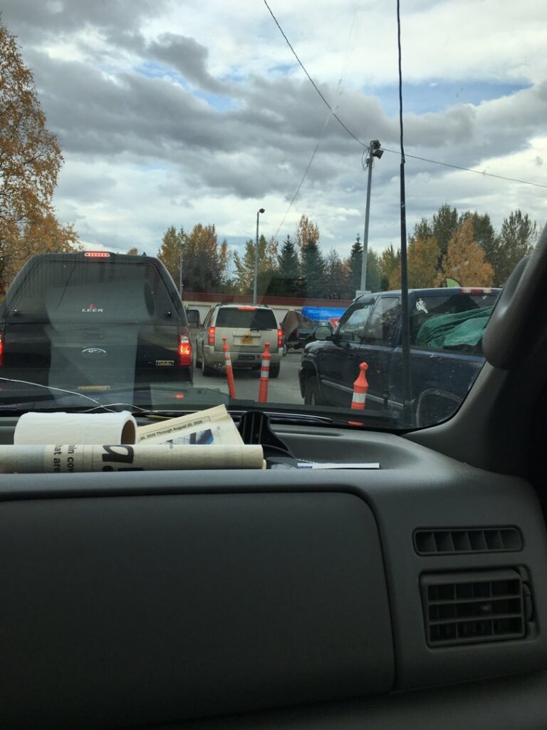 Cars waiting in line at the waste drop-off facility by Anchorage Solid Waste Services in Anchorage, AK.