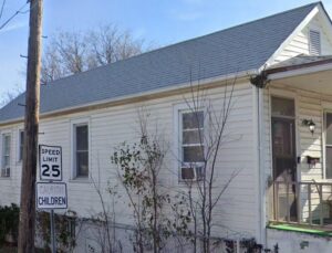 Significant ceiling damage with exposed joists and debris, requiring handyman repair services from Spartan Roofing LLC in St. Louis, MO