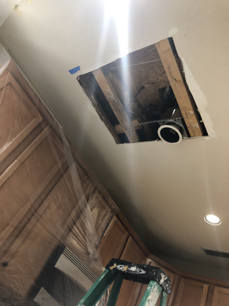 Ceiling repair showing a large hole with exposed joists and ductwork by Fonseca's Drywall, LLC in Glendale, AZ