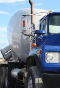 A blue cement mixer truck used for construction projects by Paris Brothers & Company, Inc in Erie, PA