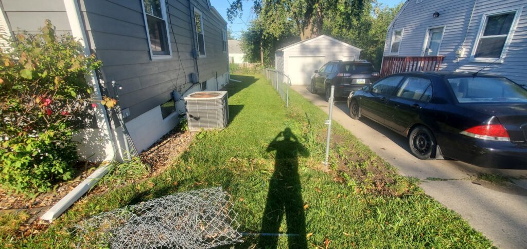 Chain-link fence installation in progress by Justin-case Repairs in Ankeny, IA.