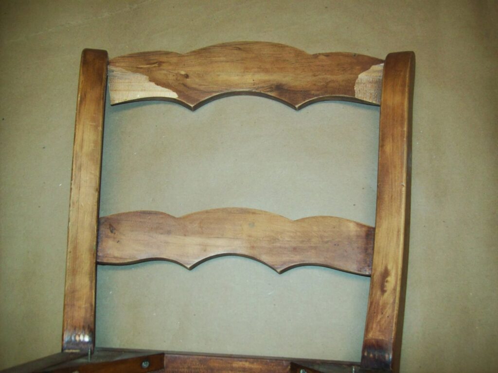 Close-up of a wooden chair back being refinished by Custom Carpentry Service in Knoxville, TN.