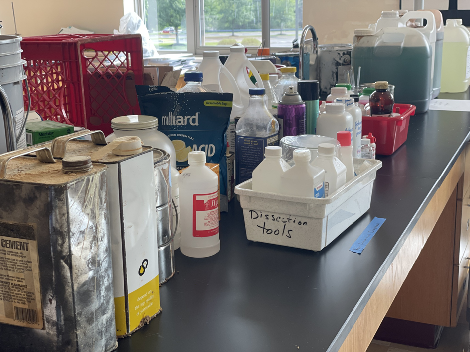 Various chemical containers on a lab bench awaiting disposal by Maine Labpack, Inc. in South Portland, ME