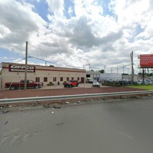 Exterior view of the Cippco Inc. business facility with trucks parked, indicating general contracting operations in Philadelphia, PA.