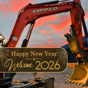 A Cippco Inc. excavator, heavy equipment used for general contracting, against a sunset sky in Philadelphia, PA.