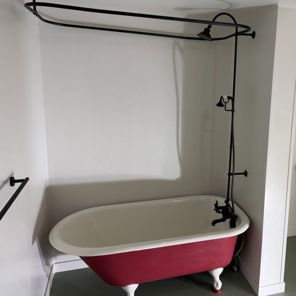 A newly installed clawfoot tub and shower fixture by Davis Home Dynamics in Springfield, OR