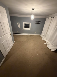 A clean and empty bedroom after a successful junk removal and cleanout service by DJ's Junk Removal in Laconia, NH.