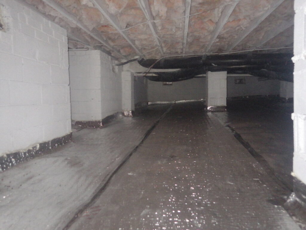 A clean and encapsulated crawl space with a vapor barrier, a service by Indoor Environmental Systems in Cary, NC.
