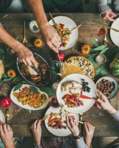 A sparkling clean interior of a green trash bin with residual water, showcasing the results of cleaning by Bin Blasters - Knoxville, TN.