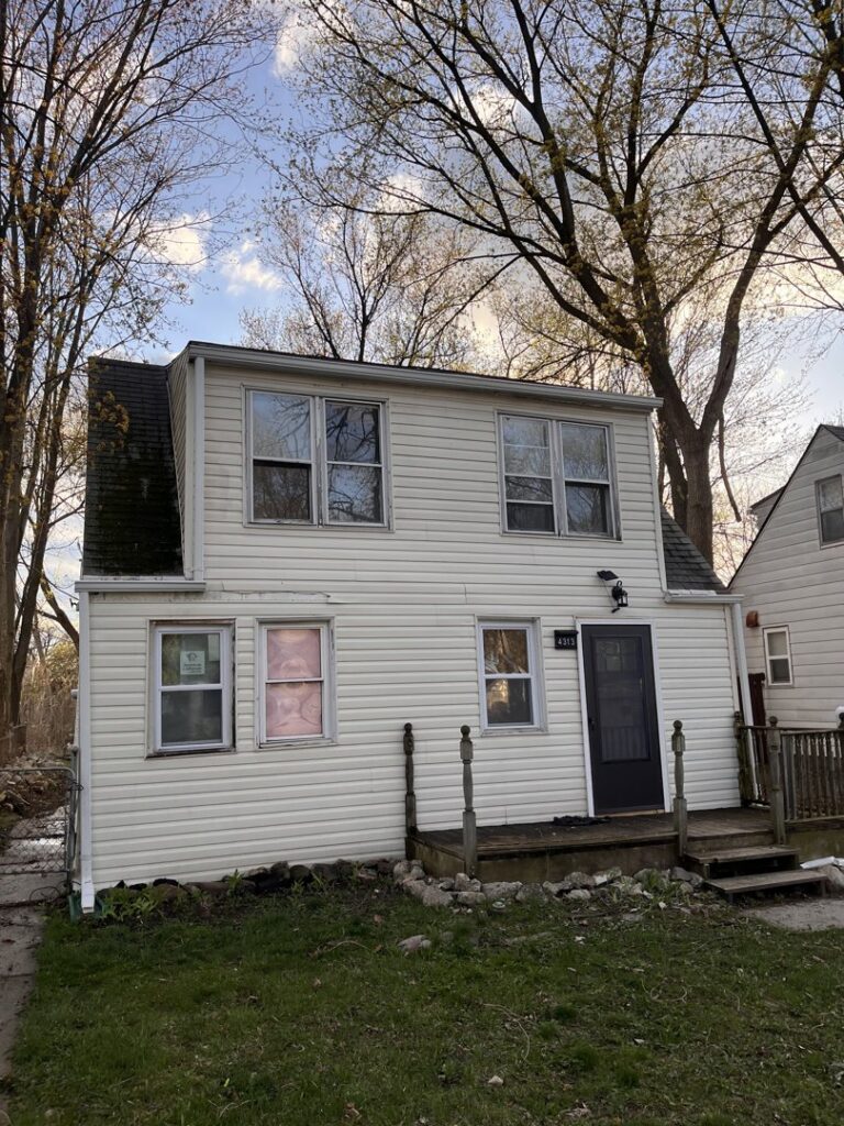 A clean and well-maintained house exterior, showcasing the results of services by Applied Pressure LLC in Detroit, MI.