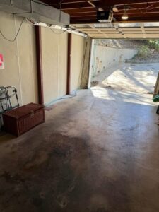 A garage completely cleaned out after a successful junk removal job by Marc & Park Junk Removal, LLC in Birmingham, AL.