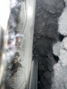 A cleaning tool working inside a heavily lint-filled dryer vent, provided by Elite Vent Cleaning in Bluebird Lane.
