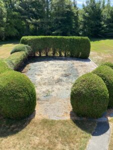 A cleared outdoor area after an above-ground pool removal service by CK Junk Removal in New Bedford, MA