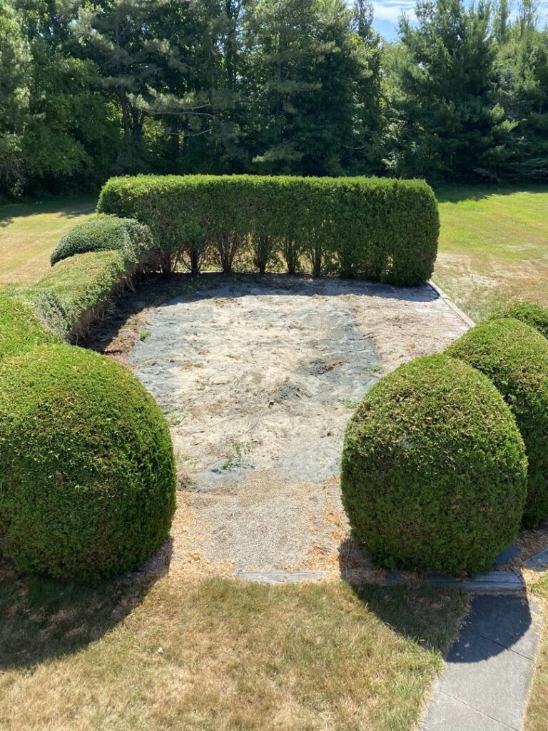 A cleared outdoor area after an above-ground pool removal service by CK Junk Removal in New Bedford, MA