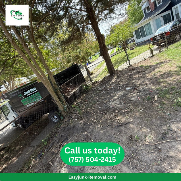A cleared backyard area after debris removal, with the Easy junk removal truck visible in Newport News, VA.