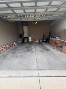 A clean and mostly empty garage after a successful junk removal service by JD Junk Removal in Raleigh, NC.