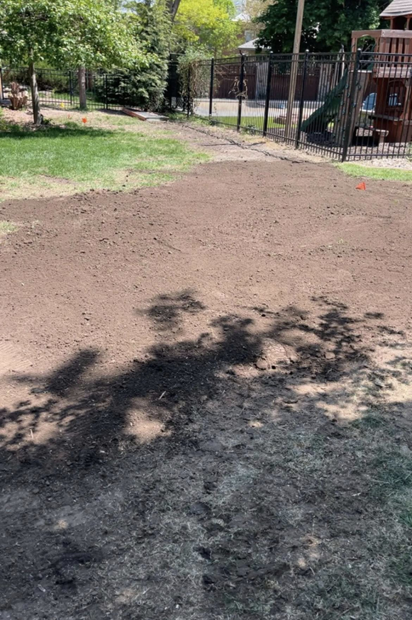 A cleared patch of ground after tree removal and debris cleanup by Toben Tree Service in Yankton, SD.