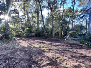 A cleared area after a tree removal and land clearing project by Robert & Sons Tree Service in Augusta, GA