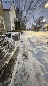 A cleared sidewalk after professional snow removal by Build Brothers in Providence, RI