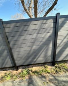 A close-up view of the grey privacy fence panels installed by Cyclone Fence in Somerset, WI.
