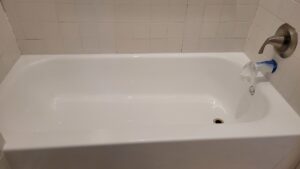A close-up view of a perfectly refinished white bathtub by Phillys Finest Tub & Tile Refinishing in Philadelphia, PA