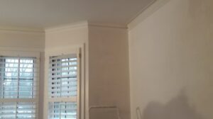 Closet shelving installation and wall finishing by Borrelli Plastering & Sons in O'Fallon, MO.