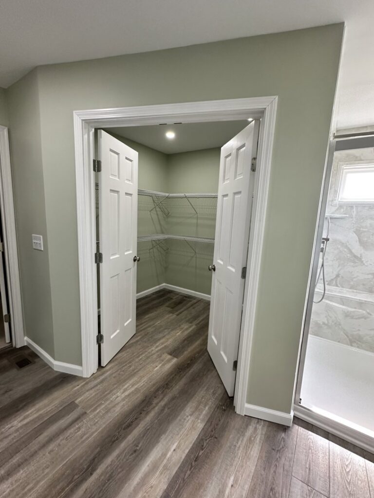 A newly installed closet with wire shelving and fresh flooring by Lynden Remodeling in Cincinnati, OH