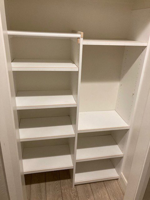 Newly installed white shelving units in a closet, a service provided by Rod's Handyman Services, LLC in Boise, ID.