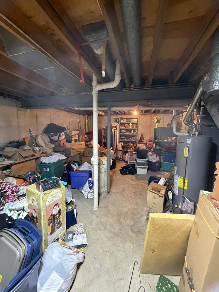 A cluttered basement filled with unwanted items, ready for junk removal by Jack My Junk in St. Charles, MO.
