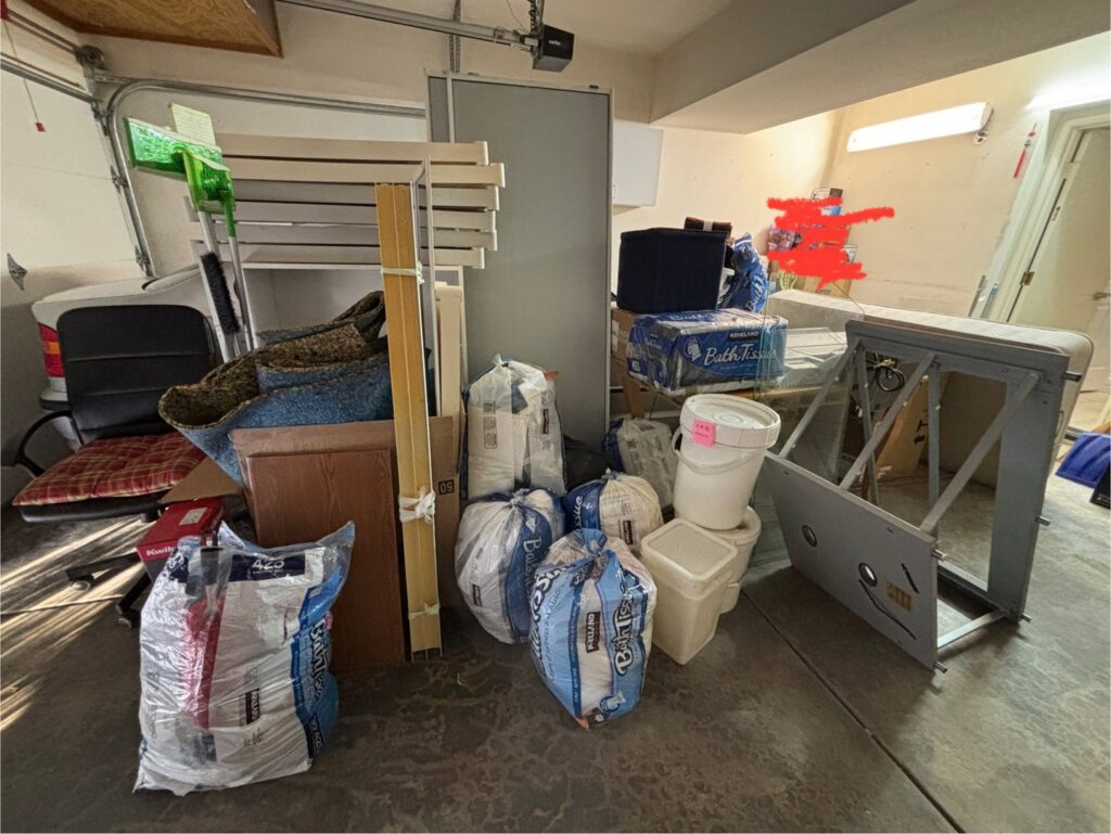 A cluttered garage filled with various items ready for junk removal by Johan's Junk Removal and Hauling in San Diego, CA