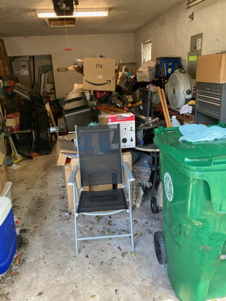 A cluttered garage filled with various household junk items, ready for removal by DUMP 4 U Hauling in Jacksonville, FL.