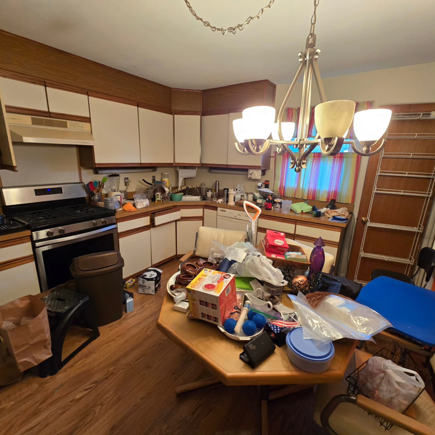 A cluttered kitchen before a cleanout or renovation project by 1st State's Finest LLC, your handyman service in Middletown, DE.