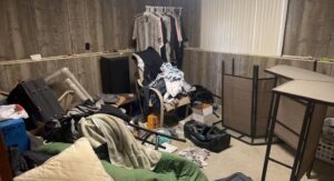 A heavily cluttered room requiring a complete cleanout service from Cash For Scrap Vehicles / Junk Removal in Minneapolis, MN.