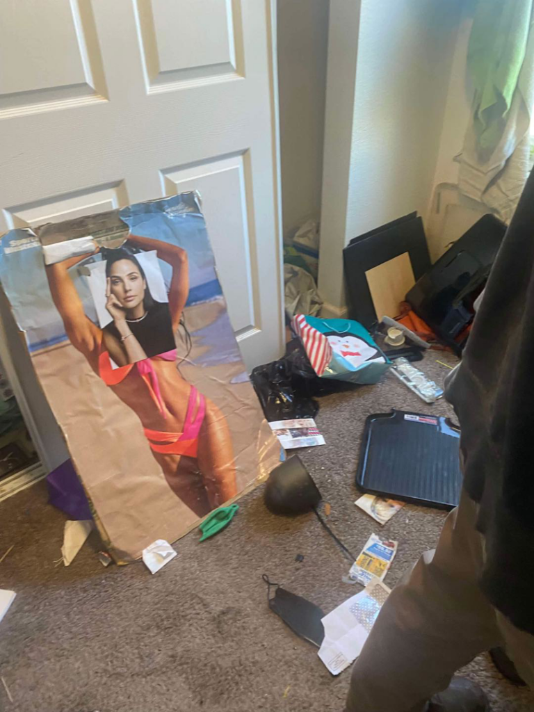Cluttered room with scattered items on the floor, ready for junk removal by Adept Junk Removal Services LLC in Tacoma, WA.