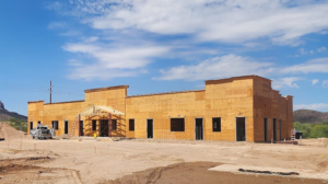 A commercial building under construction, framed with plywood, by Crosslands Companies in Englewood, CO