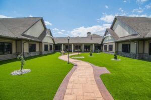 An interior courtyard with landscaping and pathways at a commercial building project by JON Construction, Inc. in Allentown, PA.