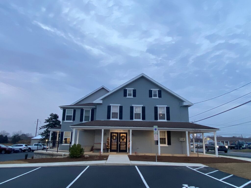 A newly renovated commercial building exterior with landscaping by GCM, INC. in Mount Joy, PA