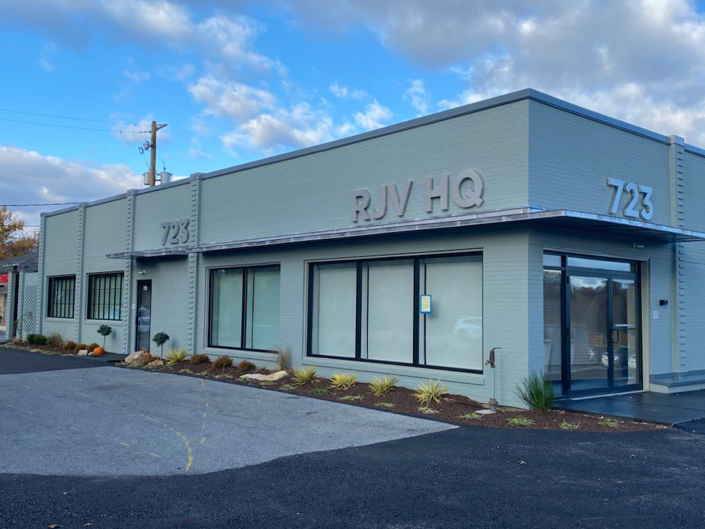 A completed commercial building exterior with RJV HQ signage by GCM, INC. in Mount Joy, PA.