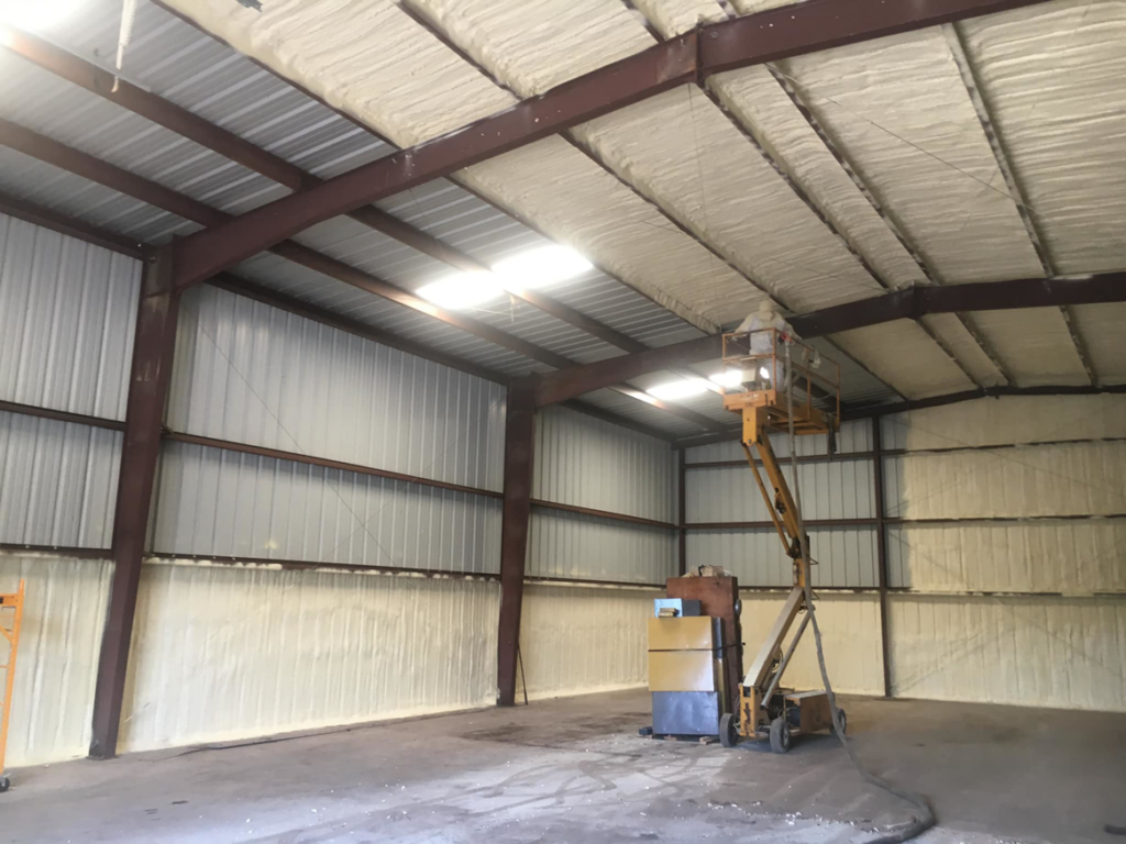 Spray foam insulation applied to the ceiling and walls of a large commercial building project by Spray Foam Solutions Of Erie in Erie, PA.