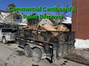 A Rubbish Doctor trailer full of cardboard and pallets for commercial removal in Portland, ME.