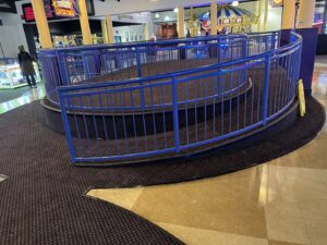 Commercial carpet and tile flooring installed in an entertainment center by D E Custom Floors in Waukesha, WI.