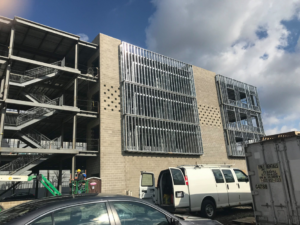 Detailed view of commercial construction with concrete block walls and steel window framing by J S Construction in Finleyville, PA