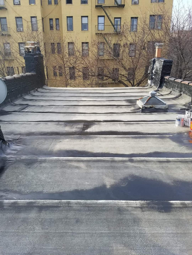 Commercial flat roof installation or repair in progress by The Best Larry Roofing corp in Mechanicsburg, PA