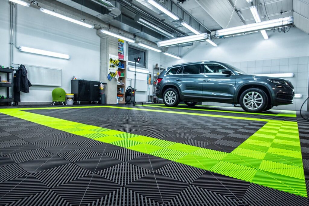 A commercial garage with a distinctive patterned floor installed by PremierGarage of Baltimore in Baltimore, MD.