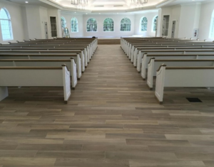 A large commercial hall with new flooring and interior renovation by Guaranteed Installations in Tampa, FL.