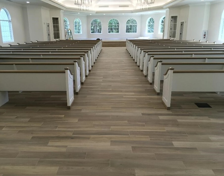 A large commercial hall with new flooring and interior renovation by Guaranteed Installations in Tampa, FL.