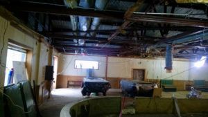 Commercial interior undergoing renovation with exposed ceiling and ductwork by Milestone Construction in Wichita, KS