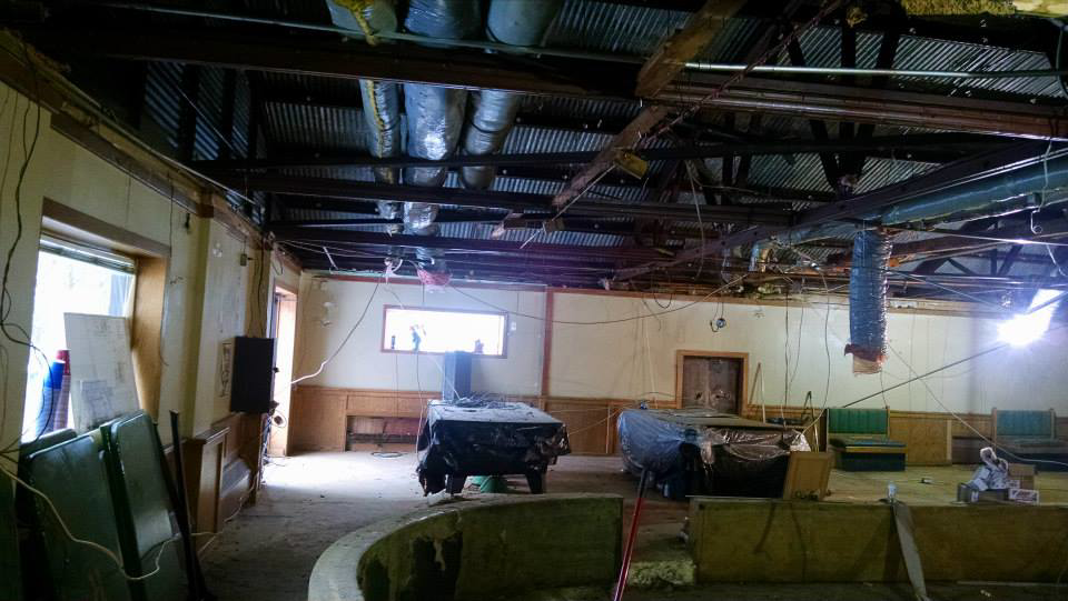 Commercial interior undergoing renovation with exposed ceiling and ductwork by Milestone Construction in Wichita, KS